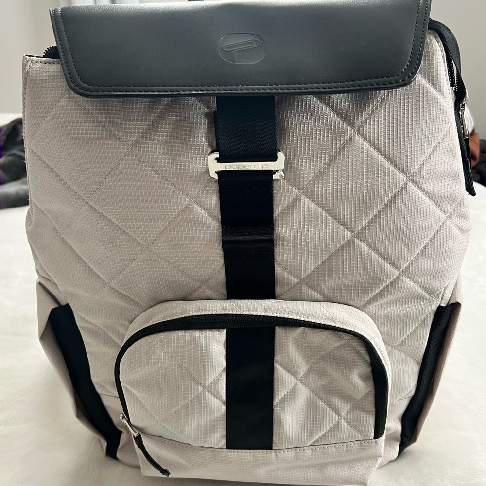 Jojo paperclip backpack diaper bag with built in changing table. NEW!